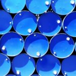 Stacked blue industrial chemical drums